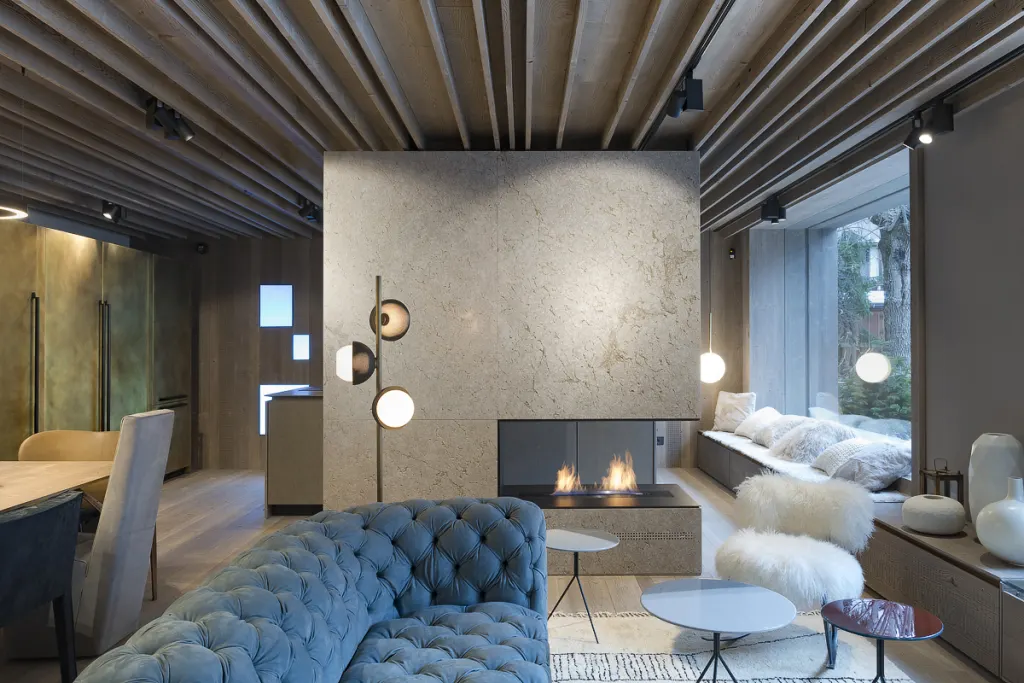 Showroom Pietra di Castellavazzo – salotto e camino
